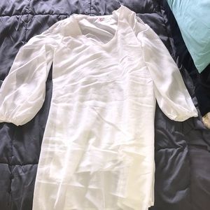 A very nice never worn long cover shirt or dress!